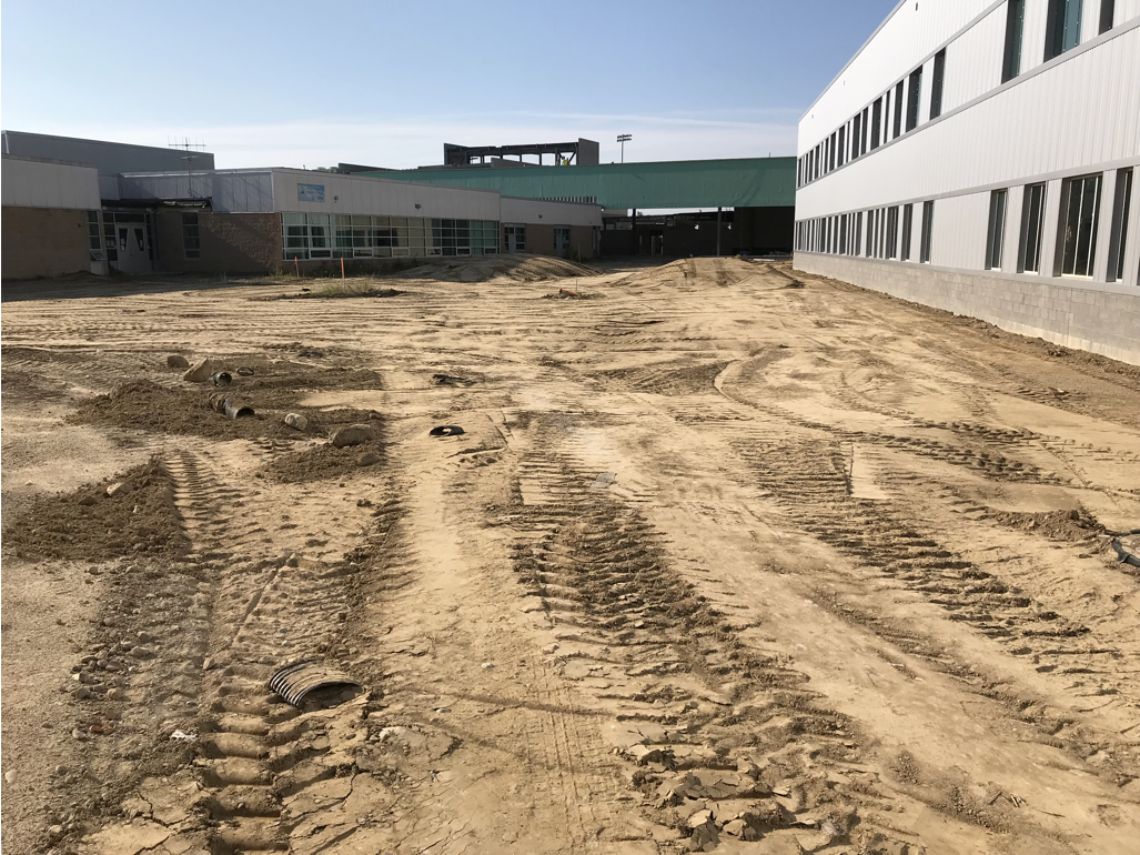 Site Development, Inc employees work on the new Romeo High School.